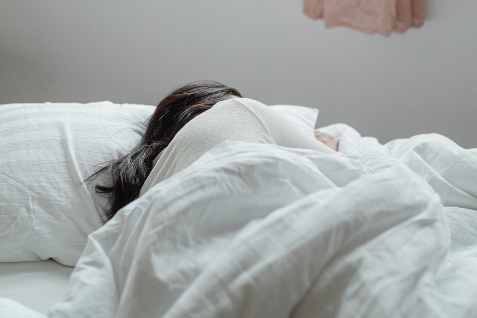 woman sleeping in bed